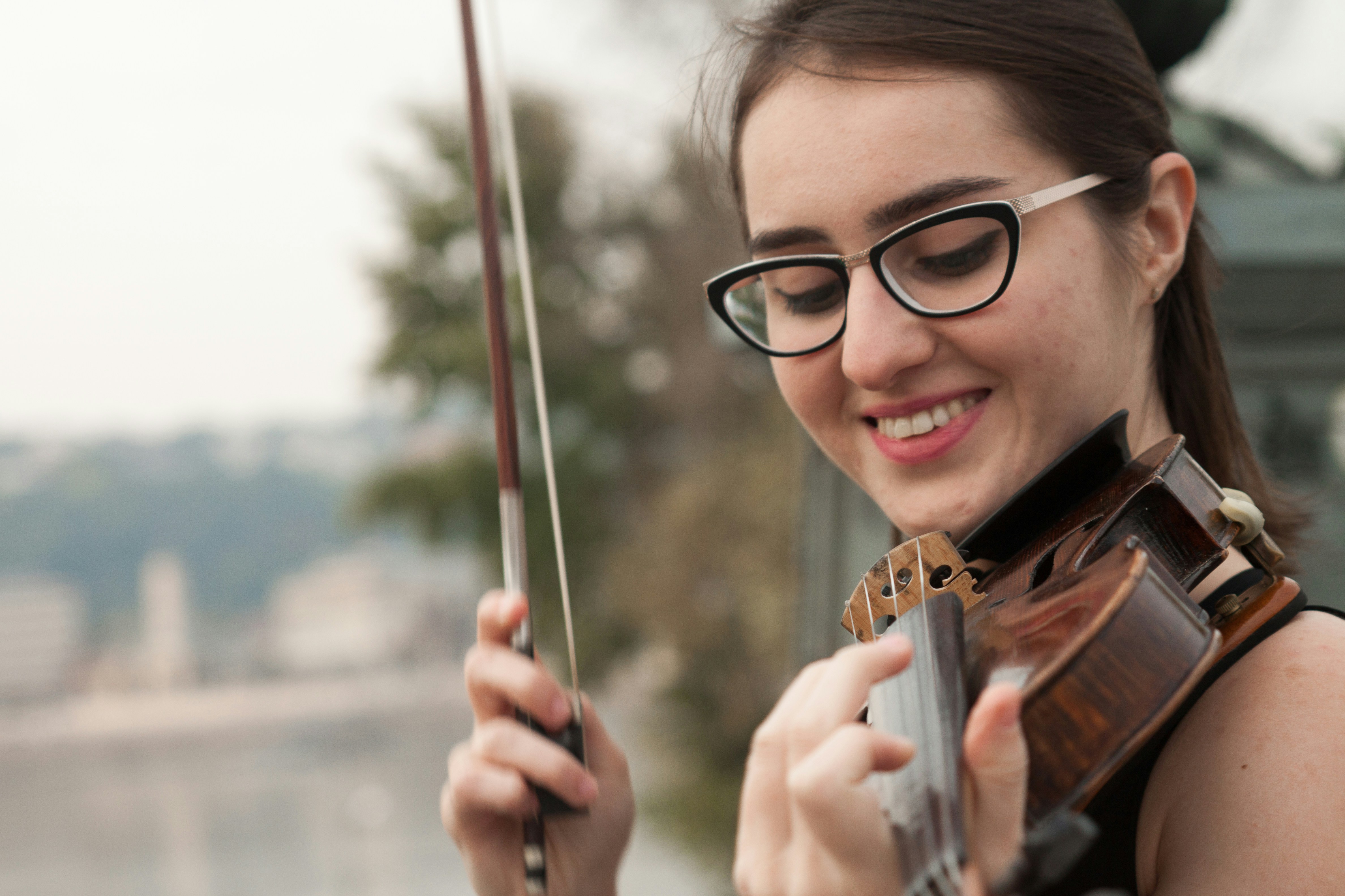 Violinist playing outdoors